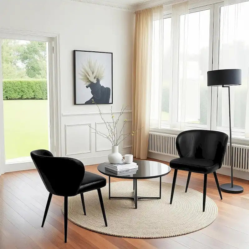 Chaise de salle à manger capitonnée en similicuir, pieds en métal noir de style Mid-Century Modern