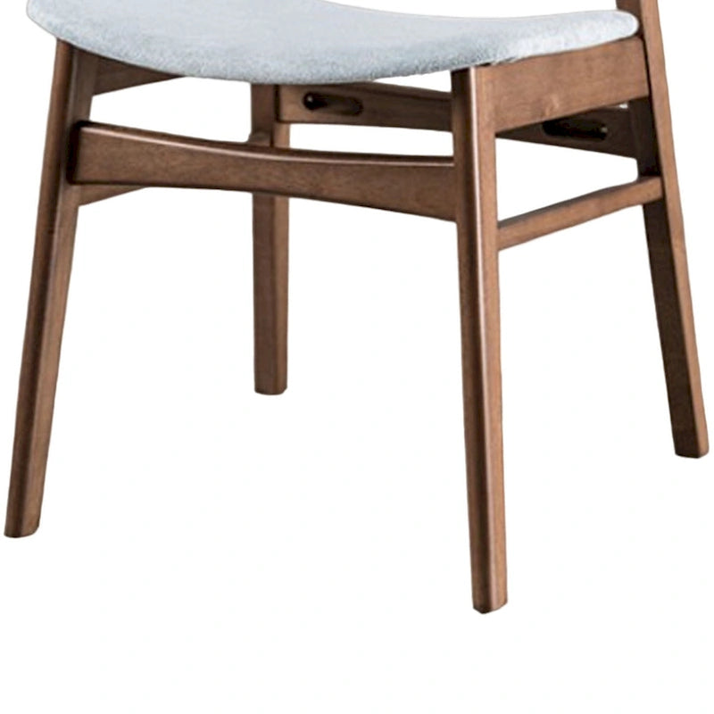 Chaise de salle à manger avec dossier incurvé, pieds inclinés, tissu gris