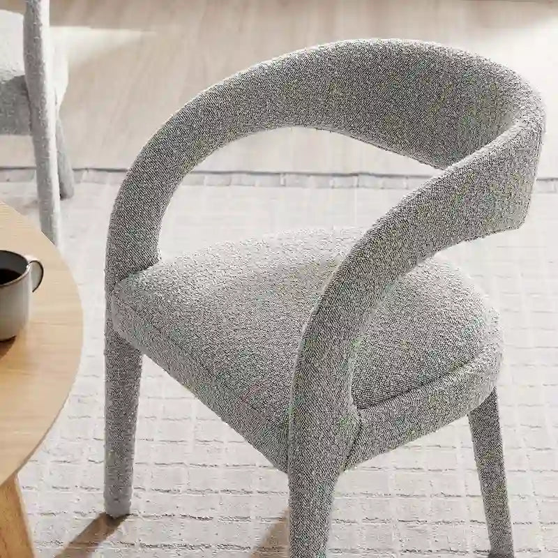 Chaise de salle à manger en tissu bouclette à dossier incurvé avec design ouvert