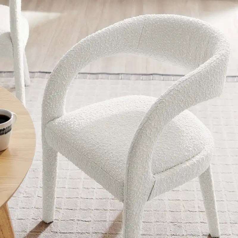 Chaise de salle à manger en tissu bouclette à dossier incurvé avec design ouvert